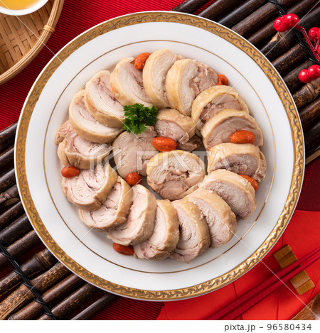 Delicious sliced chicken roll soaked in Chinese wine for lunar new year's dishes. 96580434