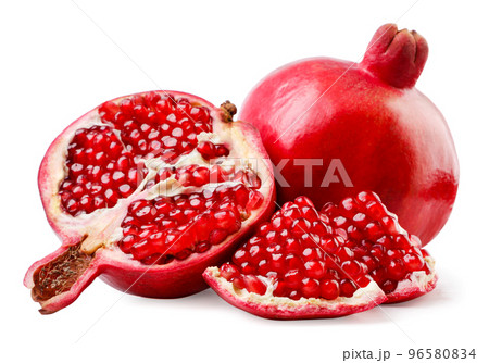 Pomegranate, half and pieces close-up on a white background. Isolated Pomegranate, half and pieces close-up on a white background. Isolated 96580834