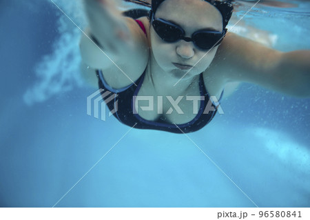 Young woman on Swimming Background 96580841