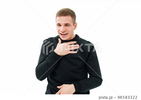 a man in black clothes coughs on a white background. he choked. 96583322