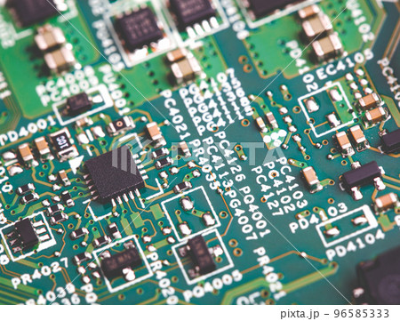 Close up of electronic components on the motherboard, microprocessor chip Close up of electronic components on the motherboard, microprocessor chip 96585333