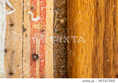Carpet tack strip exposed during a flooring home improvement project 96587066