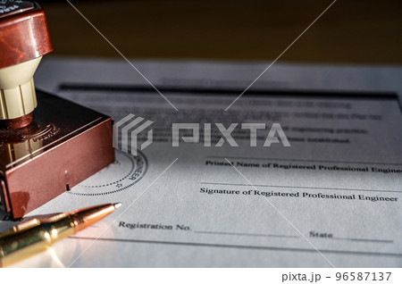 Selective focus on generic professional engineer, architecture. or surveyor stamp and certification statement 96587137