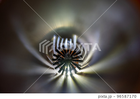 Spinning brush being used to clean out PVC tubing pipe HVAC duct. 96587170