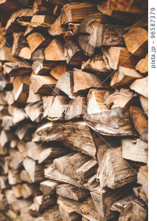beautifully stacked firewood, natural wood for burning in the furnace beautifully stacked firewood, natural wood for burning in the furnace 96587379