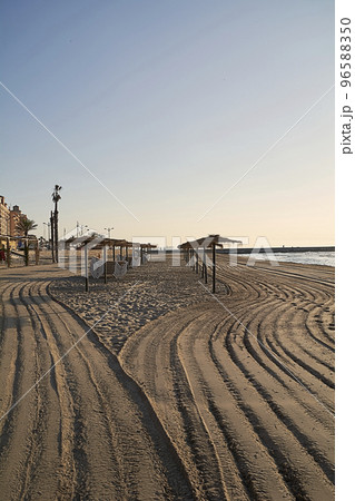 Parasols and hammocks on the beach 96588350