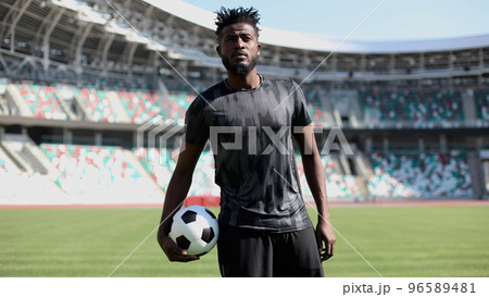Football lifestyle. Man plays the match, game. Big dream, future professional player. Football lifestyle. Man plays the match, game. Big dream, future professional player. 96589481