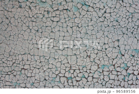 Old cracked gray blue paint. Rich texture. Old cracked gray blue paint. Rich texture. 96589556