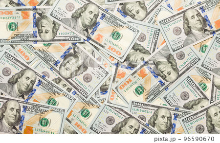 One Hundred Dollar Bills Laying on Flat Surface. One Hundred Dollar Bills Laying on Flat Surface. 96590670