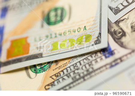 Abstraact of One Hundred Dollar Bill Laying on Flat Surface. Abstraact of One Hundred Dollar Bill Laying on Flat Surface. 96590671