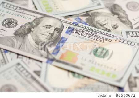 One Hundred Dollar Bills Laying on Flat Surface. One Hundred Dollar Bills Laying on Flat Surface. 96590672