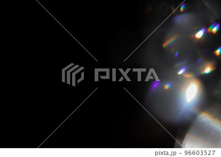 colorful rainbow crystal light leaks on black background 96603527