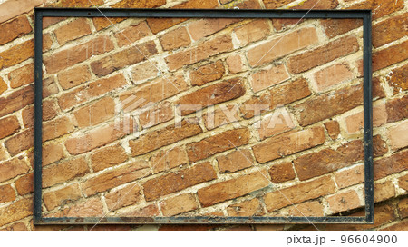 iron plate on the background of a brick wall, template 96604900
