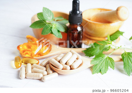 Essential oil, Alternative medicine herbal organic, mineral, drug with herb leaf natural supplements for healthy good life. Essential oil, Alternative medicine herbal organic, mineral, drug with herb leaf natural supplements for healthy good life. 96605204