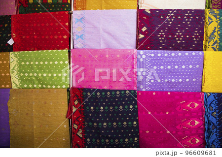 Bangladeshi Women,s Traditional Colorful Jamdani saree hanging in the retail Showrooms. Colorful Jamdani Saree Texture Background 96609681