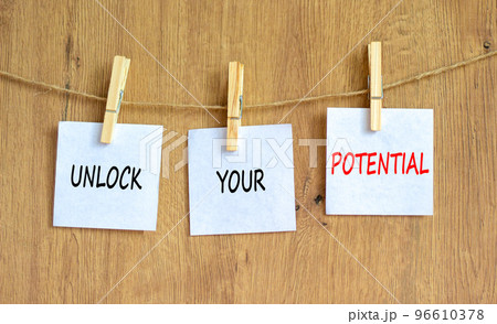 Unlock your potential symbol. Concept words Unlock your potential on white papers on wooden clothespins. Beautiful wooden background. Business unlock your potential concept. Copy space. Unlock your potential symbol. Concept words Unlock your potential on white papers on wooden clothespins. Beautiful wooden background. Business unlock your potential concept. Copy space. 96610378