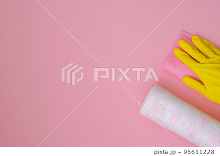 Cleaning products on pink background. Microfiber, sponges and brush. Cleaning accessories. Top view. Copy space. Cleaning products on pink background. Microfiber, sponges and brush. Cleaning accessories. Top view. Copy space. 96611228