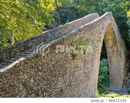 Portaikos River single arch Bridge at Pyli, Greece 96612195