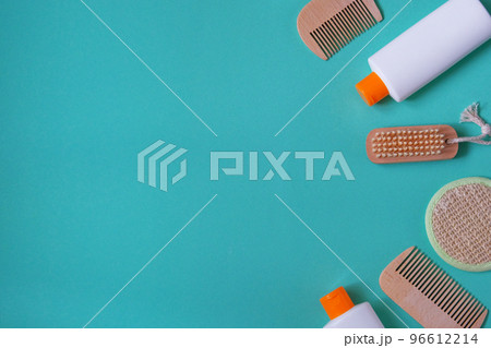 Natural cosmetics products. Cosmetic products for body and hair care on light blue background. Top view, space for text. Natural cosmetics products. Cosmetic products for body and hair care on light blue background. Top view, space for text. 96612214