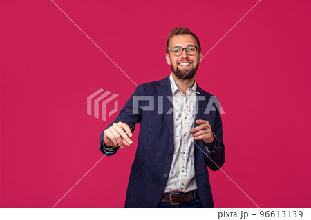 Studio shot of attractive brunette business man with glasses, in casual shirt, stylish black jacket, smiling. Studio shot of attractive brunette business man with glasses, in casual shirt, stylish black jacket, smiling. 96613139