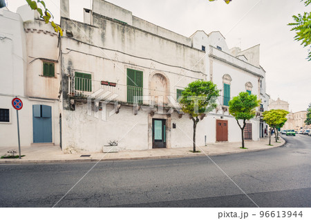 View of the old town of Martina Franca with a beautiful houses painted in white. 96613944