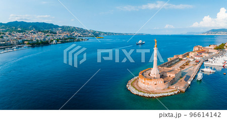 Messina, Sicily, Italy, August 20, 2022. View of the Messina's port with the gold Madonna della Lettera statue Messina, Sicily, Italy, August 20, 2022. View of the Messina's port with the gold Madonna della Lettera statue 96614142