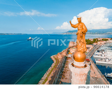 Messina, Sicily, Italy, August 20, 2022. View of the Messina's port with the gold Madonna della Lettera statue Messina, Sicily, Italy, August 20, 2022. View of the Messina's port with the gold Madonna della Lettera statue 96614178