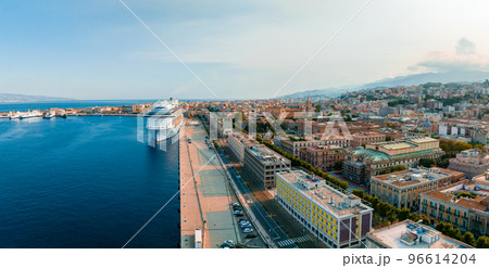 Messina, Sicily, Italy, August 20, 2022. View of the Messina's port with the gold Madonna della Lettera statue 96614204