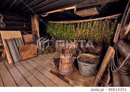 Dried herbs and branches on wooden background of ancient bathhouse Dried herbs and branches on wooden background of ancient bathhouse 96614351