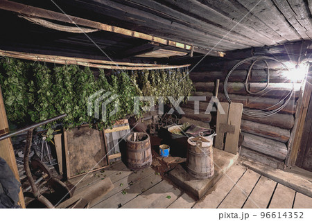 Dried herbs and branches on wooden background of ancient bathhouse 96614352