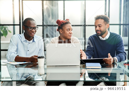 business team works sitting at the office desk. business team works sitting at the office desk. 96619551