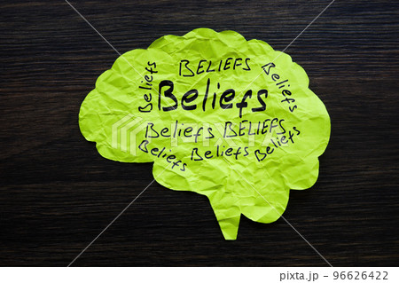 Paper brain with handwritten words beliefs. Bias concept. Paper brain with handwritten words beliefs. Bias concept. 96626422