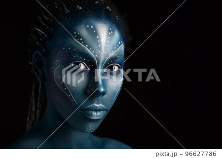 Art photo of Africal woman with tribal ethnic paintings in Avatar style Art photo of Africal woman with tribal ethnic paintings in Avatar style 96627786