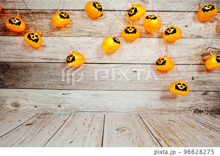 Pumpkin Lights LED for Halloween Decorations on wooden background 96628275