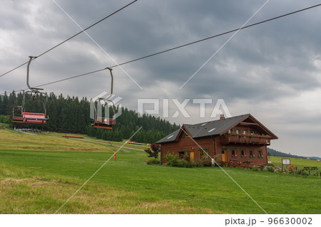 Mountain village in Jesenik mountains. Lower station of chairlift. Ski nad tourist centre in the Czech Republic. 96630002