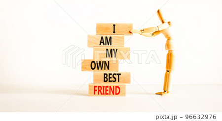 I am my own best friend symbol. Concept words I am my own best friend on wooden blocks on a beautiful white table white background. Businessman icon. Business i am my own best friend concept. 96632976