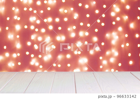 Abstract background, mockup. Defocused red lights bokeh and white wooden surface 96633142