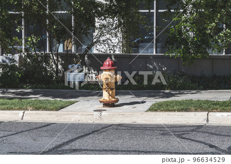Red and yellow Fire Hydrant on the street in the USA. Red and yellow Fire Hydrant on the street in the USA. 96634529