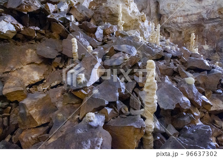 natural rock formations limestone caves. underground scenery with stalagmite and stalactite halls. inside of ursus cave in apuseni natural park natural rock formations limestone caves. underground scenery with stalagmite and stalactite halls. inside of ursus cave in apuseni natural park 96637302
