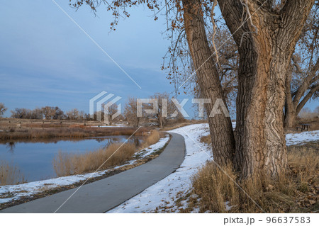 November dusk over a bike trail in Colorado 96637583