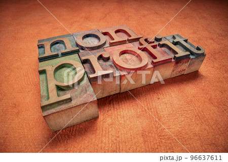 nonprofit word  in wood type 96637611