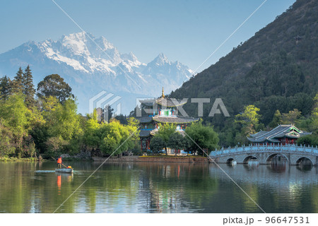 Travel China, Black Dragon Pool Landscape, a famous pond in the scenic Jade Spring Park located at the foot of Elephant Hill, a short walk north of the Old Town of Lijiang in Yunnan province. 96647531