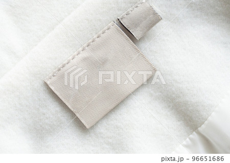 laundry care clothing label on fabric texture 96651686
