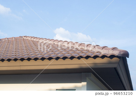 Ceramic roof tiles on the house with blue sky Ceramic roof tiles on the house with blue sky 96653210