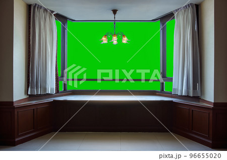 isolated glass window on green background View from inside a luxurious room. 96655020