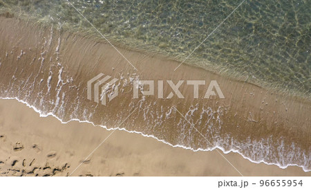 Aerial view of the sandy beach with ocean waves in summer. Nature background. 96655954