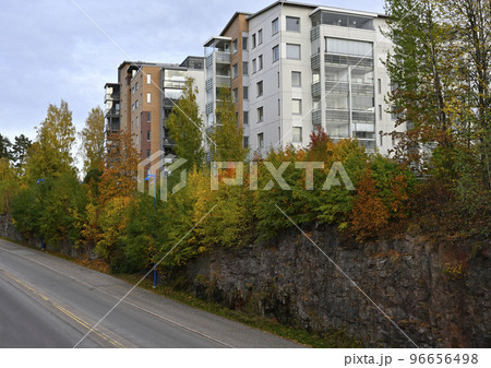 residential area on a cliff and a road in autumn residential area on a cliff and a road in autumn 96656498