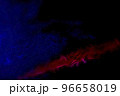 Blurred dark background with blue smoke light and red line. 96658019