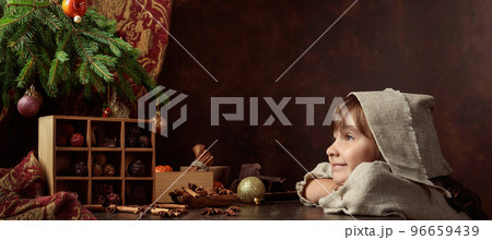Little girl and chocolates under the Christmas tree. Little girl and chocolates under the Christmas tree. 96659439