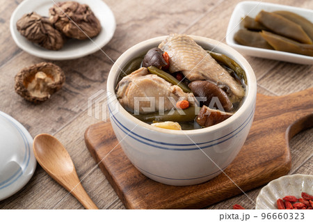 Delicious Taiwanese peeled green chili pepper chicken soup with mushroom and goji berry. Delicious Taiwanese peeled green chili pepper chicken soup with mushroom and goji berry. 96660323